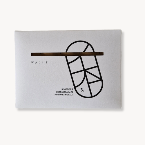 Product packaging with a black and white design on a gray background