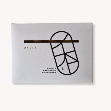 Product packaging with a black and white design on a gray background