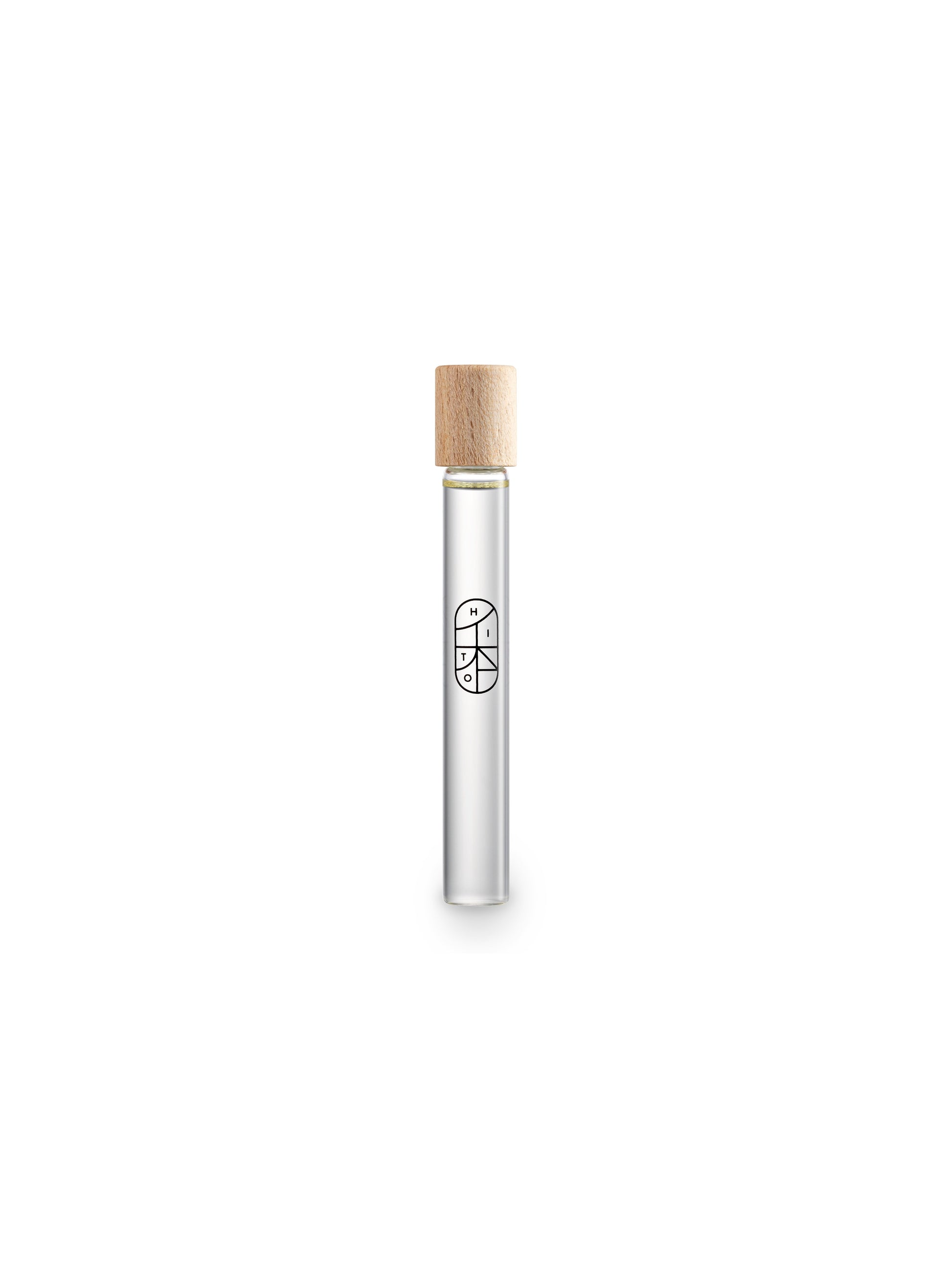 Applying HITO natural roll-on perfume with wild fig, yuzu, and elemi – Portable fragrance for wellness