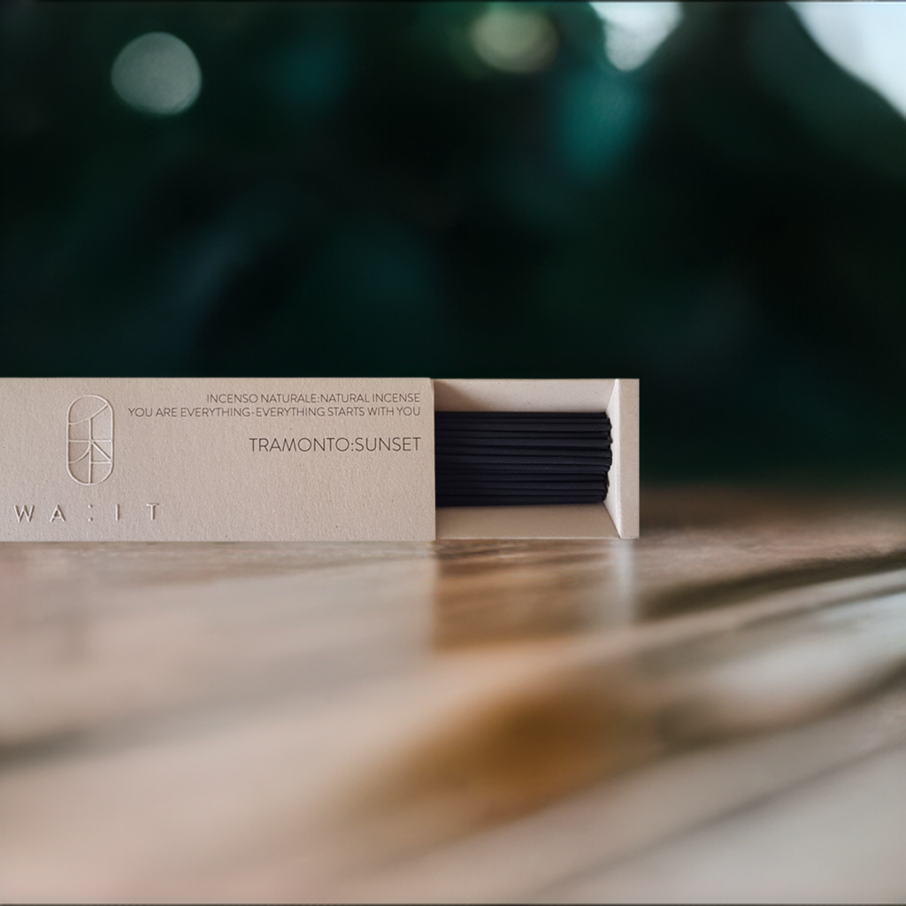 WASIT incense packaging with 'Tramonto: Sunset' text on a beige background